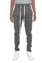 Cargar imagen en el visor de la galería, SINGLE STRIPE ANKLE ZIPPER TRACK PANTS