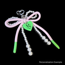 Load image into Gallery viewer, AKA White Pearl and Pink Cord Bows Heart Bag Clip