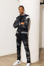 Load image into Gallery viewer, MULTI PATCH  SLIM FIT BLACK DENIM PANTS
