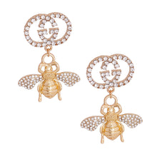 Load image into Gallery viewer, Gold Designer Logo Bee Earrings.
