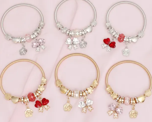 3035 - Heart Bow Jump Coil Bracelets