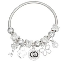 Cargar imagen en el visor de la galería, PT7 - Round GG Jump Coil Charm Bracelets INSPIRED

