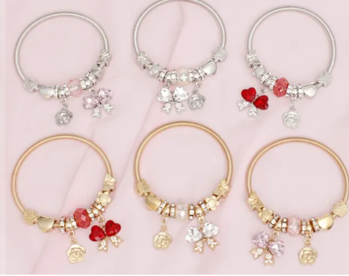 3035 - Heart Bow Jump Coil Bracelets