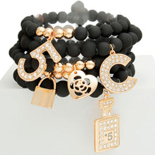 Cargar imagen en el visor de la galería, Matte Black Boutique &amp; No.5 Charm Bracelets
