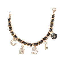 Cargar imagen en el visor de la galería, Mini Bucket Black Quilted Gold Camellia Luxe Bag
