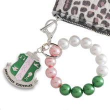 Load image into Gallery viewer, AKA Pink Green Pearl Shield Keychain
