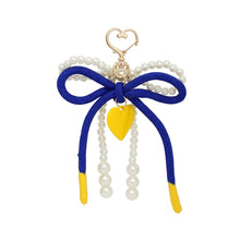 Load image into Gallery viewer, SGRHO Cream Pearl and Blue Cord Bow Heart Bag Clip
