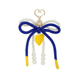 SGRHO Cream Pearl and Blue Cord Bow Heart Bag Clip