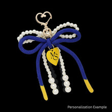 Load image into Gallery viewer, SGRHO Cream Pearl and Blue Cord Bow Heart Bag Clip
