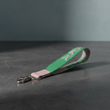 AKA Green Canvas Embroidered Wristlet Strap Clip