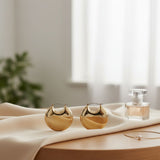 Huggie Gold Puffy Disc Crescent Hoop Earrings