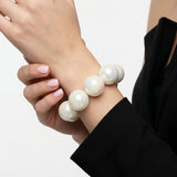 High Gloss Pearlescent White 24mm Bead Bracelet