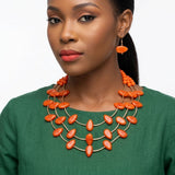 Layered Orange Disc and Gold Tube Bead Necklace