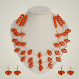Layered Orange Disc and Gold Tube Bead Necklace