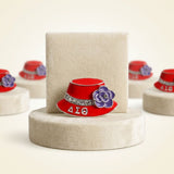 DST Greek Red Hat Brooch with Purple Flower