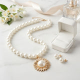 Gold Sunburst Cream Pearl Pendant Necklace