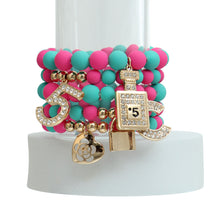 Load image into Gallery viewer, Matte Fuchsia and Teal Boutique Charm Bracelets
