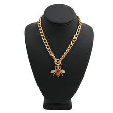 Load image into Gallery viewer, Designer Style Rhinestone Bee Toggle Necklace with Red Rhinestone Detail
